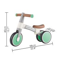 Draisienne 3 roues pour bebe des 18 mois Petit velo sans pedales vert Hape